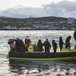 Authorities in Tromsø, Norway, board the Sam Simon.