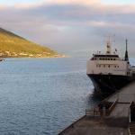 The Sam Simon passes by the Winter Bay, escorted by the Harstad.