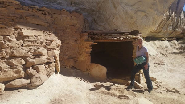 Bobbye explores ruin at Grand Gulch Primitive Area Utah (c) George Wuerthner